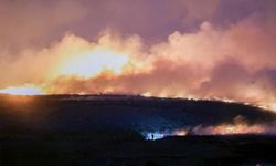 Filipinler'in başkenti Manila, çöp sahasında çıkan yangın sonucu duman altında