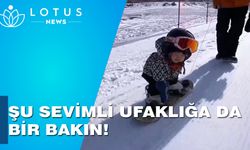 11 aylık snowboardcu Çin'de internetin gündemine oturdu