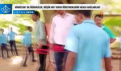 Hindistan' da öğrenciler düşük not veren öğretmenlerini ağaca bağladı