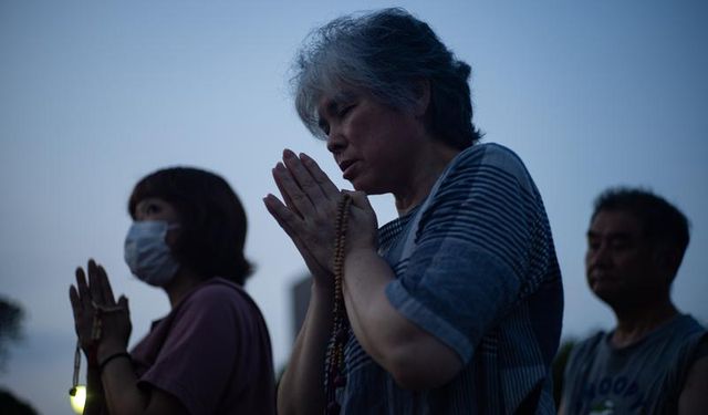 Japonya halk Hiroşima'da hayatını kaybedenleri andı, hükümeti protesto etti